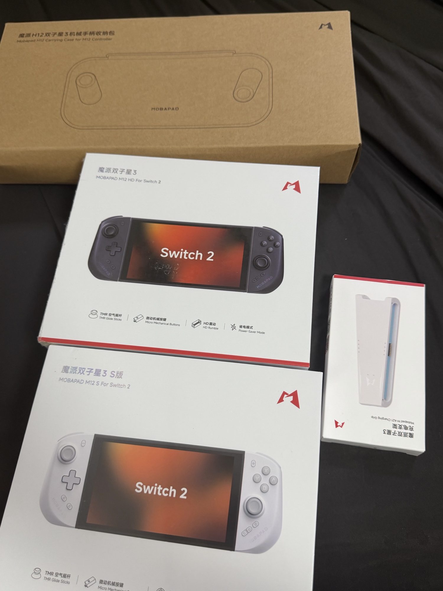 https://jrdrew.xyz/wp-content/uploads/mobapad-m12s-m12hd-charging-grip-boxes-rotated.jpg